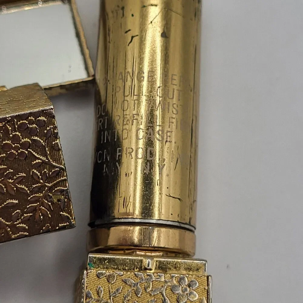 Vintage 50's Avon Gold Tone Metal Lipstick Case w. Mirror Floral Stamping 2in